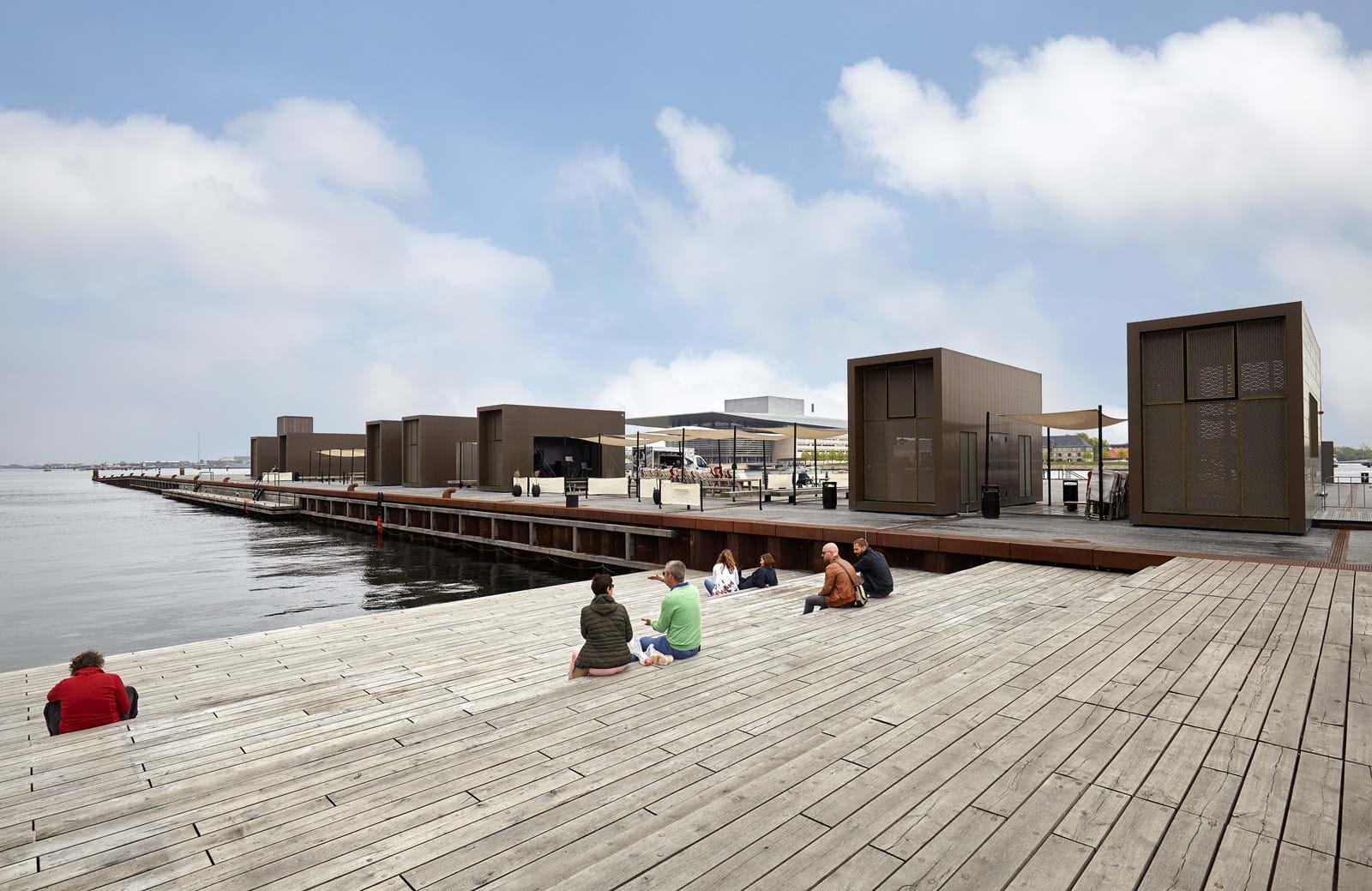 People relaxing at Kvaesthusbroen.